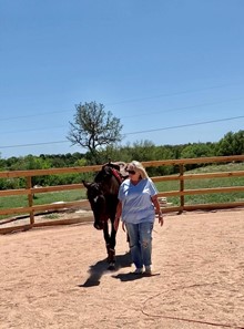 Catherine with Stephanie and a horse